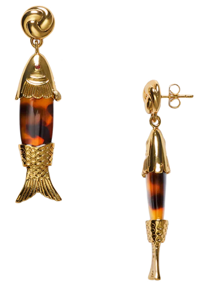 A pair of gold fish-shaped drop earrings with a translucent amber-brown bead in the center, shown on a plain white background.